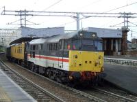 31454 in <I>BR InterCity</I> livery crawls through Paisley Gilmour Street on 22 October 2008 with the overhead line test coach <I>Mentor</I> in tow.<br><br>[Graham Morgan 22/10/2008]