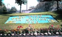 Floral display at Dumfies station in September 1987.<br><br>[David Panton 12/09/1987]