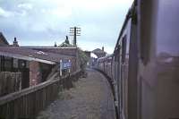 Class J37 No 64569 passing through Guard Bridge station en route to St Andrews in August 1965 with the RCTS <I>Fife Coast Railtour</I>.<br><br>[G W Robin 28/08/1965]