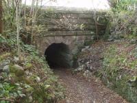 <I>Horse Creep?</I> As boats were legged through the Hincaster canal tunnel the horses had to cross the railway and go over the hill on a path that is still open. This low bridge takes the path under the Lancaster and Carlisle Railway/WCML although the floor has built up and it would be tricky to get a large animal through these days. Map Reference SD 513851<br><br>[Mark Bartlett 01/11/2008]