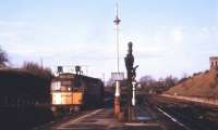 The bays (left) at the north end of Dumfries station in the early days of 1968. One of the type 2s regularly seen here during this period, including stabling at weekends (see image 3438), is standing at signals. The bays are now filled in and used for car parking, with freight workings such as those serving the former ICI factory at Cargenbridge and the old Dumfries South Yard a distant memory. At the top right of the picture is part of the <I>lighthouse</I> signal box, whose demolition so upset the late Derek Cross (see image 3568).    <br><br>[John McIntyre //1968]