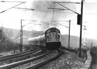 <I>Hear that Whistler blow</I>  Class 40 No. 40141 powers north towards Six Arches bridge over the River Wyre at Scorton in 1980 with a train of ICI tanks from Northwich to Corkickle on the Cumbrian Coast. <br><br>[Mark Bartlett 20/12/1980]