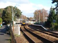 View east at Grange-over-Sands, from the adjacent public park, as a Trans Pennine service formed by 185107 calls on the way to Manchester Airport. The station was refurbished in 1997 and is still in excellent condition and in a wonderful location.<br><br>[Mark Bartlett 01/11/2008]