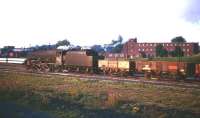 Scene at Kingmoor in the mid 1960s as Holbeck Jubilee 45626 <I>Seychelles</I> takes a freight past the site of the turntable at the outlet from the MPD. The large 3-storey building on the right is the locomen's hostel. The red van standing in the left background is part of the breakdown train, partly concealed by the shed which housed the steam crane.<br>
<br>
<br><br>[Robin Barbour Collection (Courtesy Bruce McCartney) //]