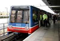 British Transport Police officers board a Docklands Light Railway service at Canning Town on 22 July 2005. This was part of a public reassurance exercise following the abortive bombing attempts in London the previous day.<br><br>[John Furnevel 22/07/2005]