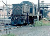 NCB North Eastern Area No 5 (ex-BR class 14) stands at Ashington Colliery in December 1982. Between November 1968 and the closure of the colliery in October 1986 no less than 19 of these locomotives spent time here. One of the shortest lived classes ever operated by BR, a total of 56 were built at Swindon in the mid 1960s, with D9555 being the last locomotive to be produced by Swindon works. Most of the class spent a significantly longer period operating in the industries to which they were subsequently sold off than they did with BR. <br><br>[Colin Alexander /12/1982]