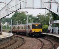 Arrival at Hamilton Central on 17 September 2008 in the form of 318 256 with a service for Motherwell.<br><br>[David Panton 17/09/2008]