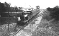 Last weekend of passenger services at Holcombe Brook sees enthusiasts capturing the scene but few ordinary passengers. This interesting view also shows the signal box, goods shed, yard crane and a mineral wagon on elevated coal drops. 50655 stands in the platform and I have been reminded that these humble branch line duties were a far cry from the express trains the 2-4-2 tanks were built for. They were fitted with two scoops to use water troughs in either direction on the L&YR main lines. <br><br>[W A Camwell Collection (Courtesy Mark Bartlett) 03/05/1952]