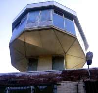 The abandoned control tower in Perth New yard looks on impassively as tracklifting gets underway in October 2008.<br><br>[Gary Straiton /10/2008]