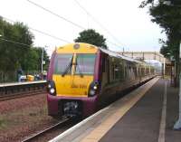 Looking towards Glasgow Central from Hillington East on 30 August as 334 020 arrives with a Gourock service.<br><br>[David Panton 30/08/2008]