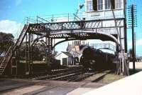 A K3 about to take a train under the signalbox and over the level crossing at the south end of Belford station, Northumberland, around 1959. [See image 16267]<br>
<br><br>[John Alexander //1959]