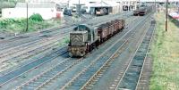 One of the Ashington Colliery ex-BR Class 14s shunting a short rake of wagons there in December 1982. The locomotive shed stands in the background.<br><br>[Colin Alexander /12/1982]