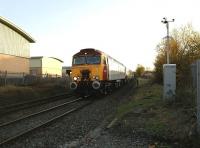 Virgin <I>Thunderbird</I> rescue locomotive 57303 <I>Alan Tracy</I> on a Pendolino drag heading for Preston at Rylands Crossing on 16 November. View is south towards Chorley station.<br><br>[John McIntyre 16/11/2008]