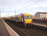 The rather featureless station at Stevenston welcomes 334 027 with a service from Glasgow Central bound for Largs on 12 November 2008.  <br><br>[David Panton 12/11/2008]