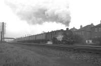 A Glasgow Central - Gourock stopping train photographed at Hillington East in May 1963 behind a standard class 5 4-6-0.<br><br>[Colin Miller /05/1963]