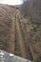 Cutting at Arndean, two miles west of Rumbling Bridge, on the former Devon Valley Railway. Note the masonry retaining walls on both sides of the trackbed.<br><br>[Bill Roberton 19/11/2008]