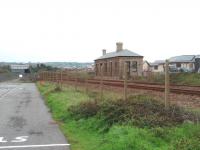 Still in use, and in good condition forty four years after closure in 1964, Marazion station building stands alongside the down main line. This view is to the east towards St Erth. The sea lies just behind the new housing development on former railway land.  <br><br>[Mark Bartlett 15/09/2008]