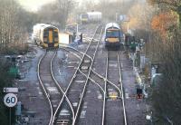 The final phase of the Edinburgh - Bathgate redoubling project was the redesign of Newbridge Junction. The new layout is seen here on 24 November 2008 with the 1518 Edinburgh - Bathgate taking the branch as the 1500 ex-Glasgow Queen Street approaches on the main line heading for Waverley. The train in the background is standing in the loop. [See image 19736] <br><br>[John Furnevel 24/11/2008]