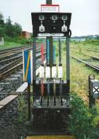 The old ground frame at Markinch station in July 1998. Looking south from the end of the platform with the former yard and junction for the Leslie branch to the right.<br><br>[David Panton /07/1998]