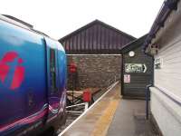 The former trainshed at Windermere has been successfully incorporated into a Booths supermarket with the buffers now located just outside the building. 185110 is standing in the replacement 1986 station shortly after arrival from Oxenholme on 27 November 2008.<br><br>[Mark Bartlett 27/11/2008]