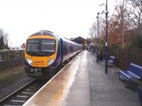 A very wet Windermere station sees 185110 ready to depart for Manchester Airport. There is basically an hourly service on the branch although the through trains only call at Kendal station and not Staveley or Burneside.<br><br>[Mark Bartlett 27/11/2008]