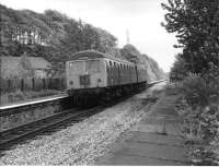 The tilted cap and beaming smile means that Alf Davenport is at the controls of the Cravens twin-powercar DMU pulling into Summerseat after a 70mph run up from Bury Bolton St. Alf was one of five drivers in the Bury diesel link at the end of the Rawtenstall passenger services along with Paddy Delaney, Freddie Thomas, Tommy Unsworth and Harry Lofthouse and relief driver <I>Gorton Joe</I> Walker. There had been six but Arthur <I>(Mad Mac)</I> McCormack transferred to the Bury <I>Leccie Link</I> before the line closed and the other five drivers followed on 5th June 1972. These diesel drivers made the local teenage enthusiasts very welcome on the trains and I shall always be grateful to them for encouraging our hobby. <br><br>[W A Camwell Collection (Courtesy Mark Bartlett) 27/05/1972]