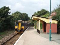 Replica Western Region <I>totems</I> and other signs add to the atmosphere at Penmere, which serves a suburb of Falmouth. FGW 153373 is on the tail of a service departing for Truro in September 2008.<br><br>[Mark Bartlett 16/09/2008]