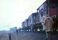 BR Standard class 3MT 2-6-0 77005 stalled while taking <I>Scottish Rambler No 5</I> towards Polkemmet Colliery on 8 April 1966. The engine is seen here restarting after the train of 12 brake vans was divided.<br><br>[G W Robin 08/04/1966]