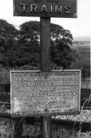 Notice alongside a boarded crossing, probably at Sunnywood Halt, on the Holcombe Brook branch stating in no uncertain terms: <br>
L&Y RAILWAY COMPANY. <br>
PERSONS using this crossing are STRICTLY FORBIDDEN<br>
to touch the RAILS provided for supplying ELECTRIC CURRENT<br>
to the trains and anyone TRESPASSING in this manner does so ENTIRELY AT OWN RISK. I presume there were a few of these signs along the length of the branch, and perhaps the Manchester to Bury line too, and wonder if any have survived. <br>
<br><br>[W A Camwell Collection (Courtesy Mark Bartlett) 26/07/1953]