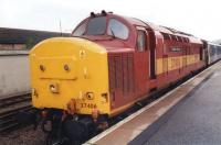 A smart looking 37 406 <I>The Saltire Society</I> stands at Fort William with the Sleeper in October 2004.<br><br>[Sandy Steele /10/2004]