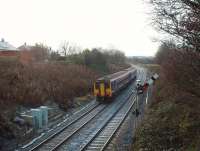 156452 on a Blackpool North service heads westwards away from Poulton on a day when the frost never left this shallow cutting. the line of trees in the middle distance is the closed Poulton Curve that allowed through running between Blackpool and Fleetwood.<br><br>[Mark Bartlett 03/12/2008]
