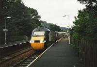 The up <I>Highland Chieftain</I> leaves Pitlochry in July 1999.<br><br>[David Panton /07/1999]