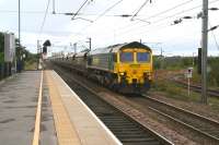 Freightliner 66523 speeds south through Northallerton with loaded coal hoppers on 3 October 2008. <br><br>[John Furnevel 02/10/2008]