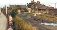 The former Newcastle & North Shields Railway terminus at Tynemouth seen from the west in July 1981, showing the part of the trackbed and the old hotel building on the right. There was also a connecting branch that ran from here down to the pier.<br><br>[Colin Alexander 25/07/1981]