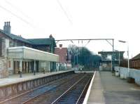 View from Balloch Central over the level crossing towards Dumbarton in 1984. Balloch Central was closed in April 1988 following the construction of a replacement station on the other side of the A811 Balloch Road.<br><br>[Colin Miller //1984]