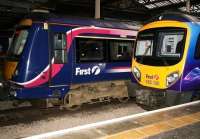 First ScotRail 170 and First TransPennine 185 services stand together at the west end of Waverley in December 2007.<br><br>[John Furnevel /12/2007]