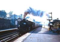 Stanier Black 5 4-6-0 no 45377 off Bolton shed speeds through Oxenholme station with a northbound express in the 1960s.<br><br>[Robin Barbour Collection (Courtesy Bruce McCartney) //]