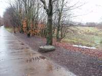 Although the overhead wires of the Holcombe Brook branch were replaced by a third rail system in 1918, several catenary mast support bases, such as this one at Sunnywood Halt, have lasted the intervening 90 years and still sit alongside the Kirklees Trail. View towards Tottington. <br><br>[Mark Bartlett 13/12/2008]