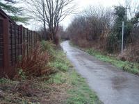 This is approximately the position where Cam Camwell took his picture of the RCTS special train passing Sunnywood Halt [See image 21364] in 1953 after visiting the Holcombe Brook branch. The trackbed is now the Kirklees Trail running from Greenmount to Woolfold. Ironically, the houses that were some distance from the line have now spread until they back onto it in places and it would probably be much better used if it were open today. <br><br>[Mark Bartlett 13/12/2008]