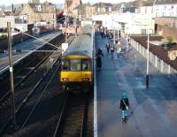 View towards the buffer stops at Largs on 10 December 2008 with a service from Glasgow Central standing at platform 2. Platform 1 is required to accomodate additional trains at peak times.<br><br>[David Panton 10/12/2008]
