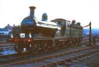 Ex-GNSR 4-4-0 No 49 <I>Gordon Highlander</I> takes water at Gorgie East on 16 October 1965 during a stop with a Branch Line Society Railtour.<br><br>[Robin Barbour Collection (Courtesy Bruce McCartney) 16/10/1965]