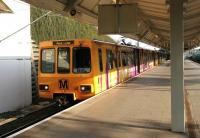 Tyne and Wear Metro unit 4061 stands at Newcastle Airport on 10 May 2006 with a service to Park Lane. The destination, one stop on from Sunderland, lies directly below one of the UK's busiest bus stations.<br><br>[John Furnevel 10/05/2006]