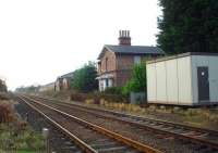 Haxby closed in 1930 but the station building is still used as a house, standing alongside the York to Scarborough line. This view is from the level crossing towards York. <br><br>[Mark Bartlett 15/12/2008]