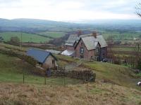 The highest mainline station in England from 1861 until Dent opened in 1877. This is Barras, midway between the site of the Belah viaduct and Stainmore summit, with magnificent views down to the Eden Valley. It closed in 1962 with the line and the main station building has been removed to Kirkby Stephen East for safekeeping. The platform remains are still visible though along with a small shelter and the station house is still a home.<br><br>[Mark Bartlett 28/12/2008]