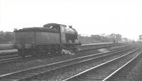 Old box camera shot of J37 0-6-0 no 64557 at Arkleston Junction in July 1960 having brought in a freight via the CGU line. The J37 was a St Margarets locomotive at the time.<br><br>[Colin Miller /07/1960]