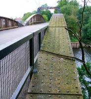 The former route of the ECML over the old swing bridge at Naburn, North Yorkshire, bypassed following the 1983 realignment. View north west over the bridge towards York on 30 September 2008 with the River Ouse below. The former trackbed is now part of a long distance walking/cycling route.<br><br>[John Furnevel 30/09/2008]