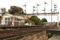 Towards the south end of the former excursion platform 1 at Scarborough stands Falsgrave signal box, seen here looking north west on 28 September 2008. The length of this platform can be appreciated by looking back beyond Belgrave Terrace Road Bridge towards the dome standing above the station in the right background and the FTP 185 unit that can just be seen stabled in platform 2 (whose buffer stops stand alongside those of platform 1). To the left of Falsgrave Road SB is the sealed entrance to Falsgrave Tunnel, which, prior to 1965, brought the line from Whitby into Scarborough and, until 1981, provided a route through to Gallows Close yard and the carriage sidings at Northstead.<br>
<br><br>[John Furnevel 28/09/2008]