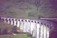 An unidentified BRCW Class 27 takes a Mallaig bound service across Glenfinnan viaduct in September 1977.<br><br>[Mark Bartlett 14/09/1977]