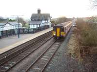 A Northern Rail Leeds to Morecambe Service, formed by Sprinter 150228, rumbles over the small viaduct and into a frosty Clapham station. The station house is now a private residence and the unstaffed halt, with its staggered platforms, is in quite a remote location as Clapham village is over one mile away. View east towards Settle Junction.<br><br>[Mark Bartlett 15/12/2008]