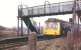 The short branch line to Royton closed in 1966 but Royton Junction station on the <I>Oldham Loop</I> remained open. It was well away from anywhere though and, after nearby Derker opened in 1985, it was allowed to close in 1987. A Derby DMU is seen here heading for Oldham with the Royton branch formation visible beyond the Rochdale platform. Although the line remains open all trace of Royton Junction (and of the branch terminus) has gone.<br><br>[Mark Bartlett /02/1972]